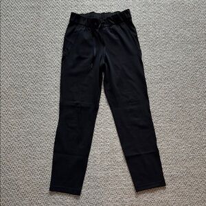 Lululemon On the Fly 7/8 pant black size 2 (basically new used twice)